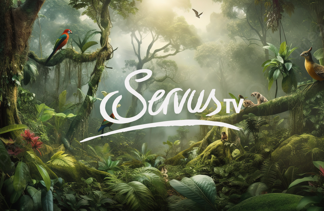 Lush green jungle scene with various birds perched on branches. Sunlight filters through the dense canopy. Servus TV logo is centered in white.