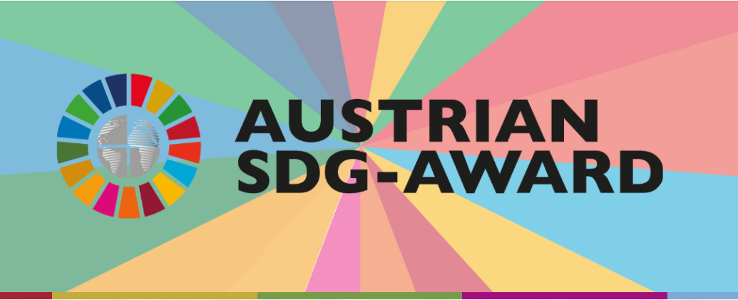 The logo for the Austrian SDG Awards 2023 showcases colorful radial beams and a globe encircled by vibrant segments symbolizing the Sustainable Development Goals. The text "Austrian SDG Awards" is prominently displayed in black, highlighting its significance.