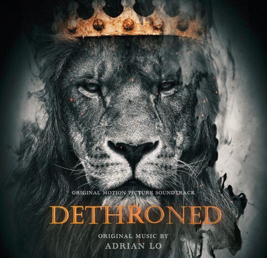 A majestic lion crowned in gold stands against a smoky, dramatic backdrop. The words "Dethroned" and "Original Music by Adrian Lo" are prominently displayed, evoking the cinematic quality of an award-winning documentary soundtrack cover.